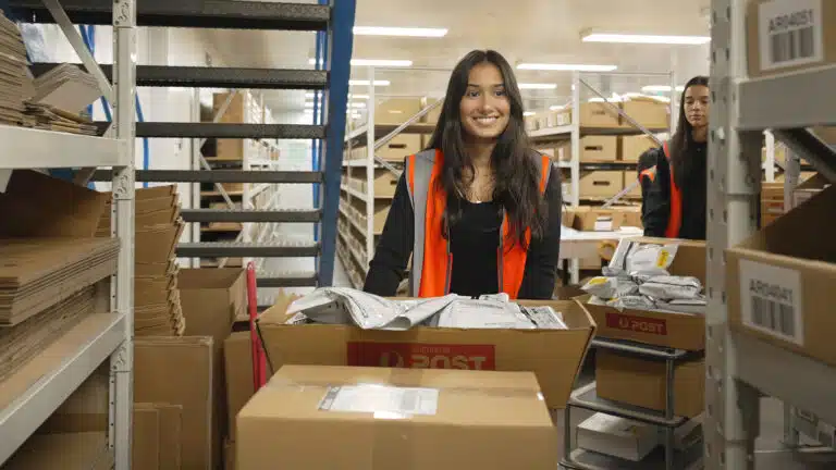 Two Fulfilment Australia employees arranging goods in the warehouse